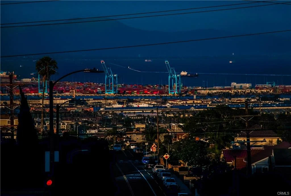 Port with shipping containers and cranes