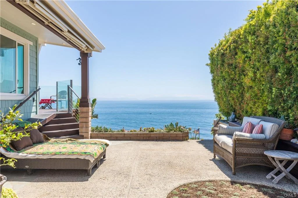 Patio with seating and ocean view